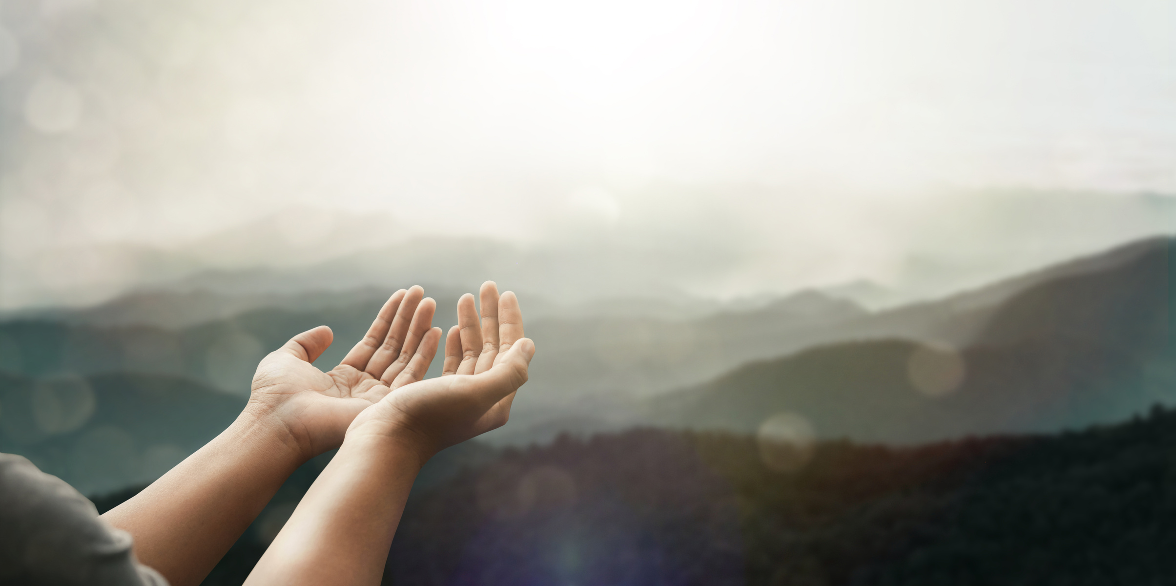 The two hands of a young man who prayed for hope from God Pr